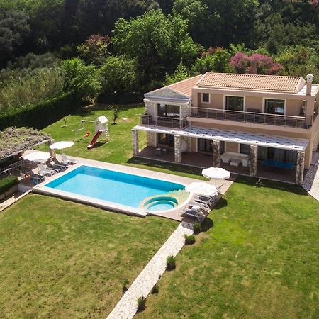 Luxury Villa Hera - Beachfront روذا المظهر الخارجي الصورة