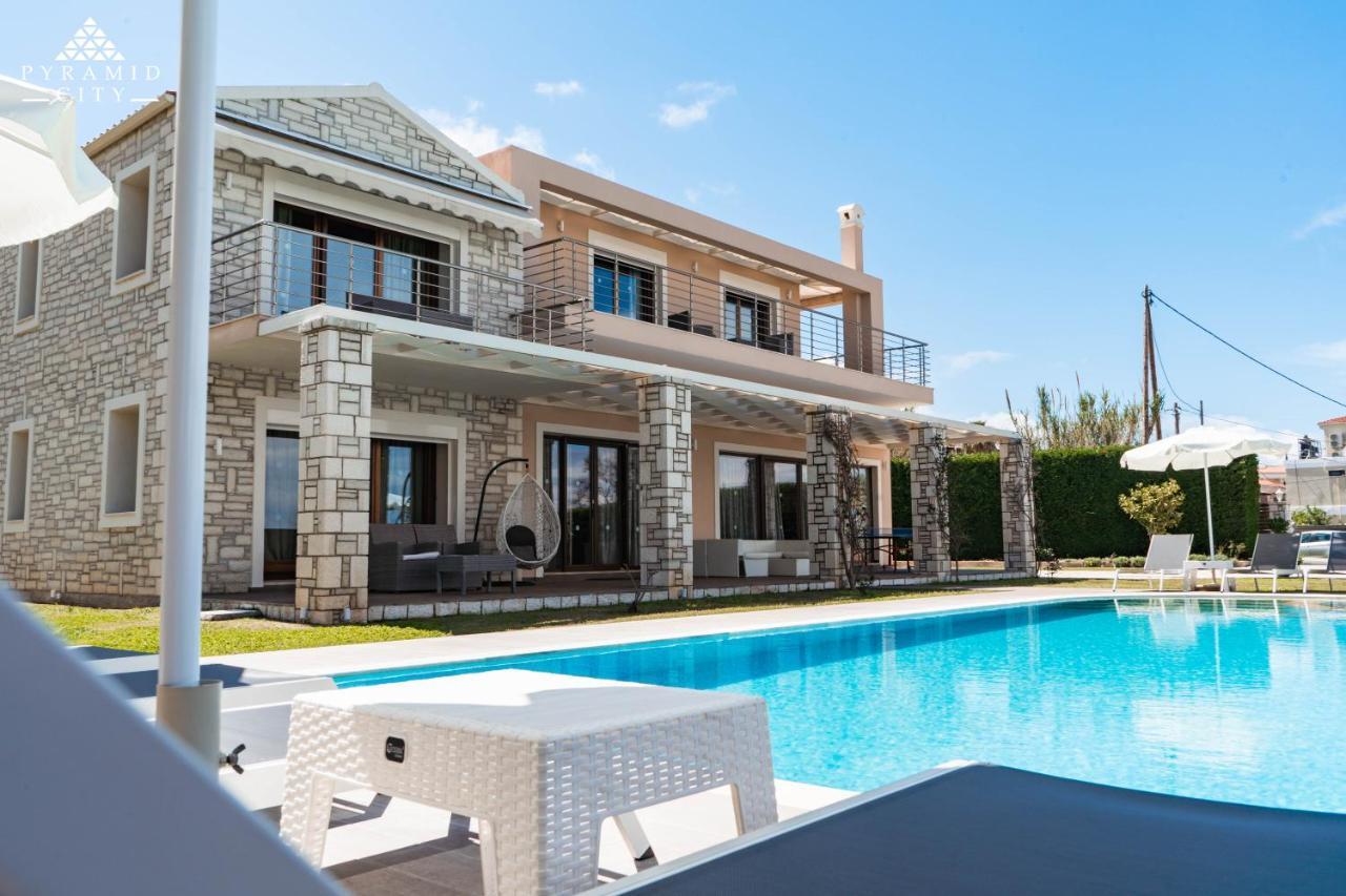 Luxury Villa Hera - Beachfront روذا المظهر الخارجي الصورة